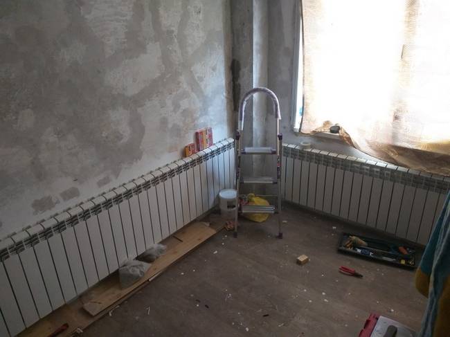 8 négyzetméter, 54 radiátor-elem. Itt senki sem fog fázni.