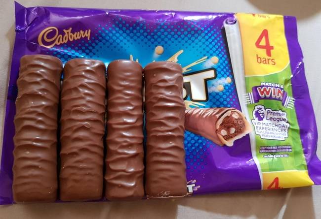 A csomagolás és a benne található csokoládék valódi mérete.