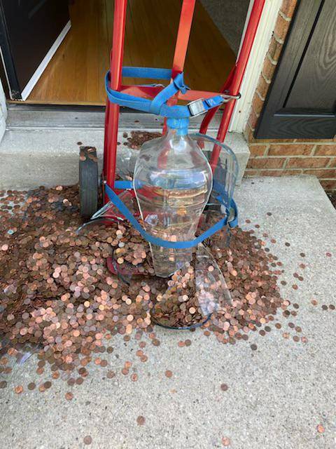1625323542 after weeks of fretting we decided a dolly was the best way to move the pennies my dad has collected since 1989 in an antique glass water jug we were wrong
