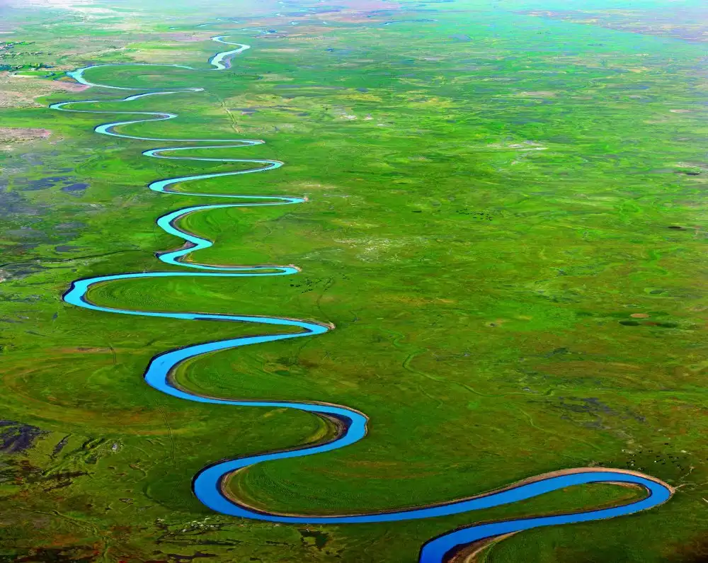 Miért kanyarognak a folyók ahelyett, hogy egyenes vonalban folynának? erózió, folyó, folyómeder, geomorfológia, holtág, kanyarulat, meander, természet, Tisza, vízfolyás